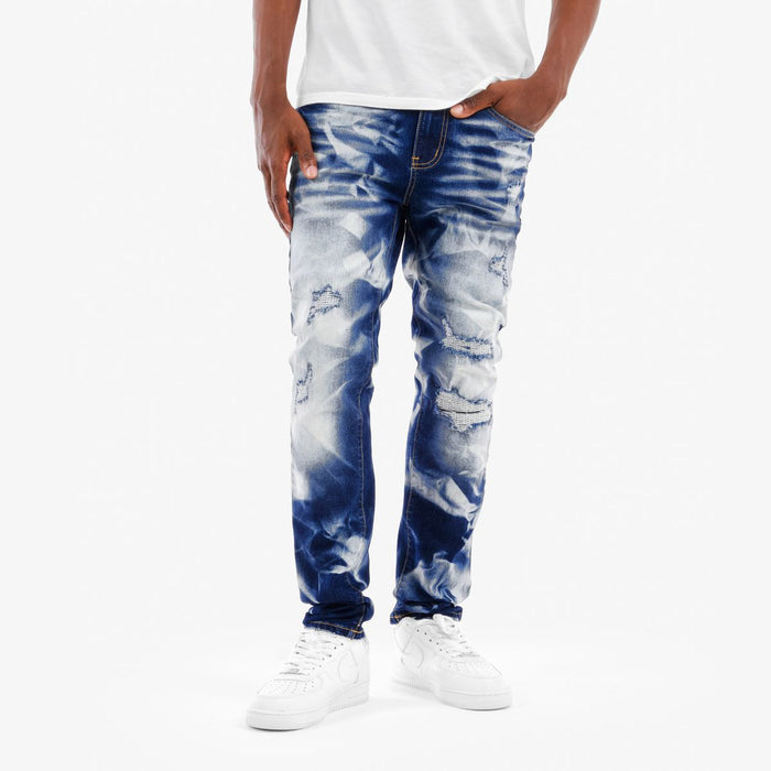 Copper Rivet Rip Heavy Bleach Wash Denim jeans, showing distressed denim with rip details and light bleach effects.