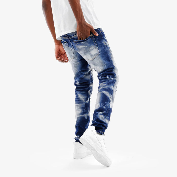 Copper Rivet Rip Heavy Bleach Wash Denim jeans showing distressed denim with ripped details and bleach patterns.