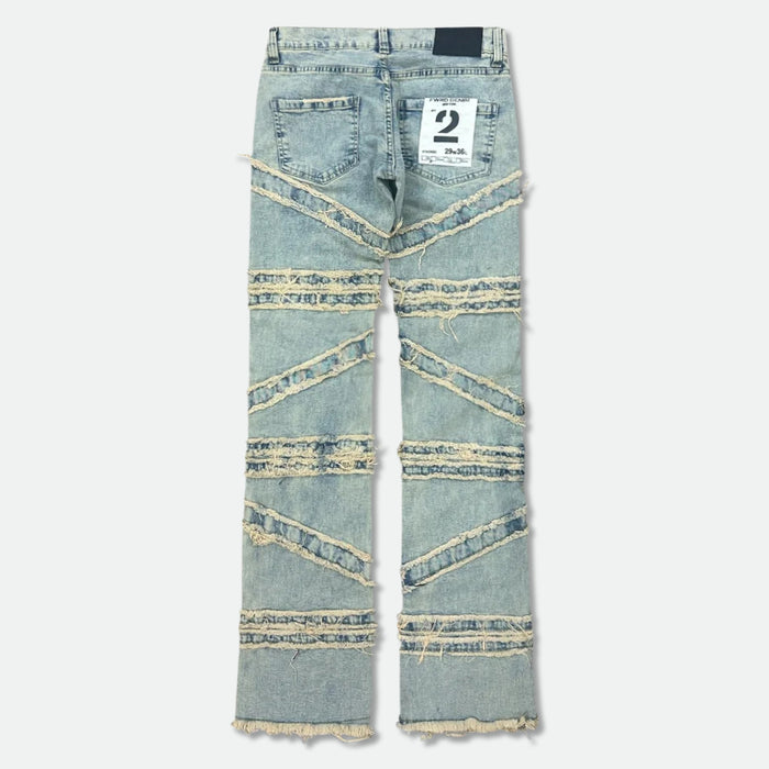 FWRD Crossover Stacked Denim in Ice Tint, stylish stacked denim jeans displayed on a model.