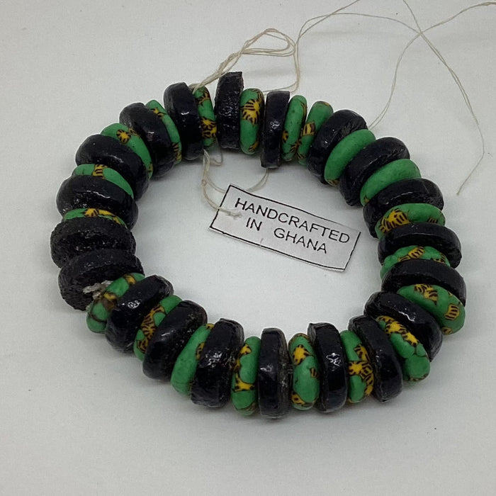 Black spacer green yellow white beads