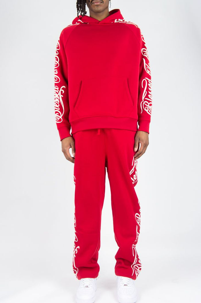 Red Rebel Minds Blessed fleece sweatpants with logo patch, comfortable fit, and relaxed style shown in this image.