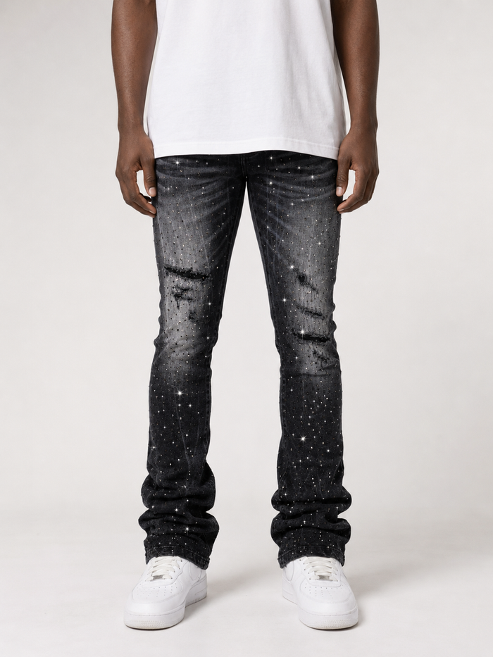 Smoke Rise All Rhinestone stacked flare denim jeans in hematite black with rhinestone embellishments and layered flare design.