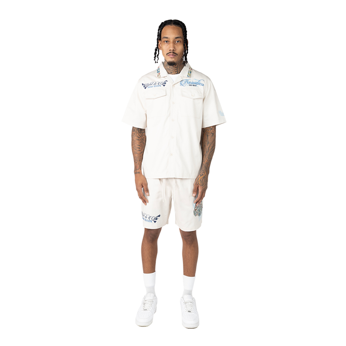 Smoke Rise Coeur Riviera twill shorts in chalk color, showcasing their casual fit and stylish design for men.