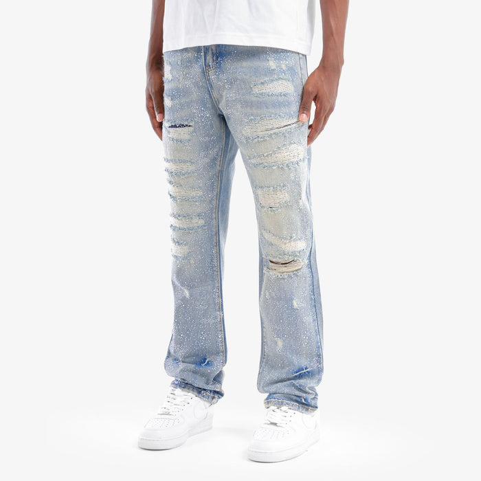 VOYAGE STUDIO Stone On Repair full rhinestone straight fit denim jeans in light blue with distressed details and repair accents.